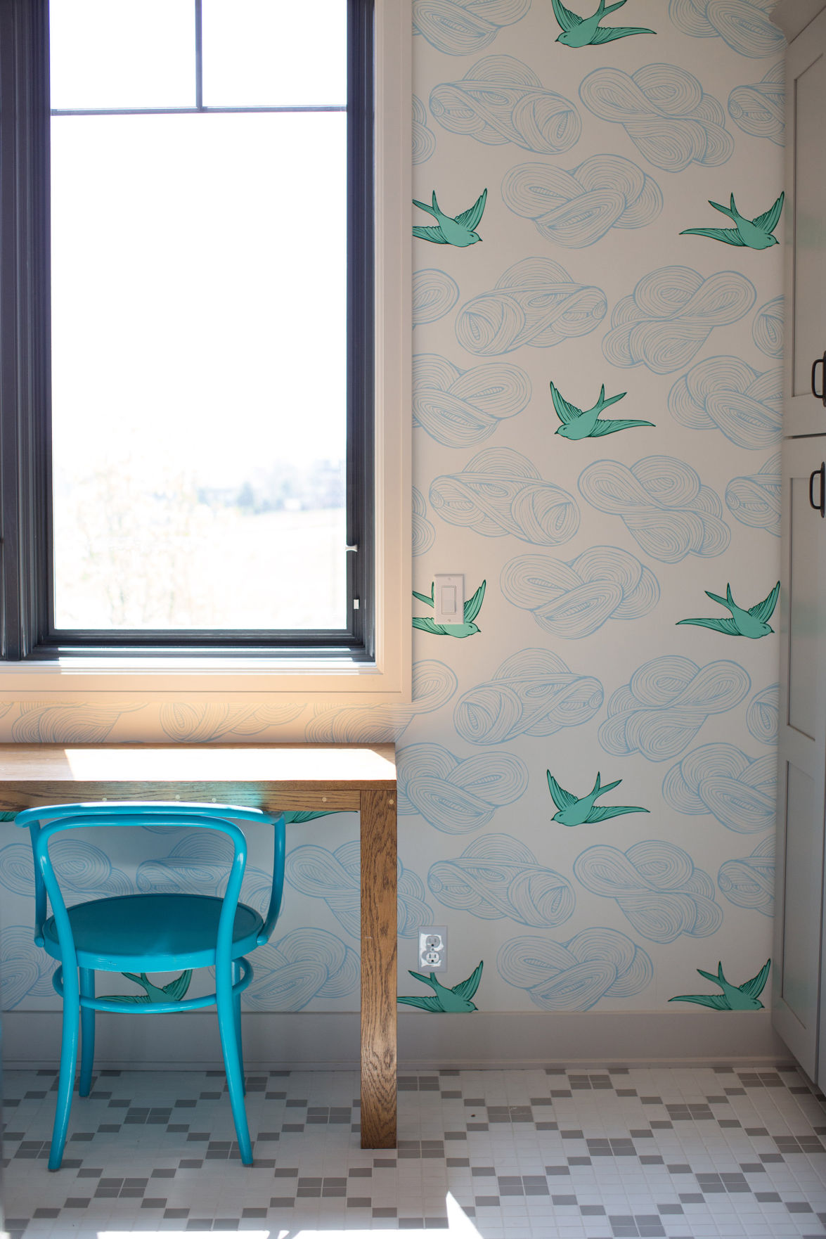 Laundry room with Hygge & West wallpaper